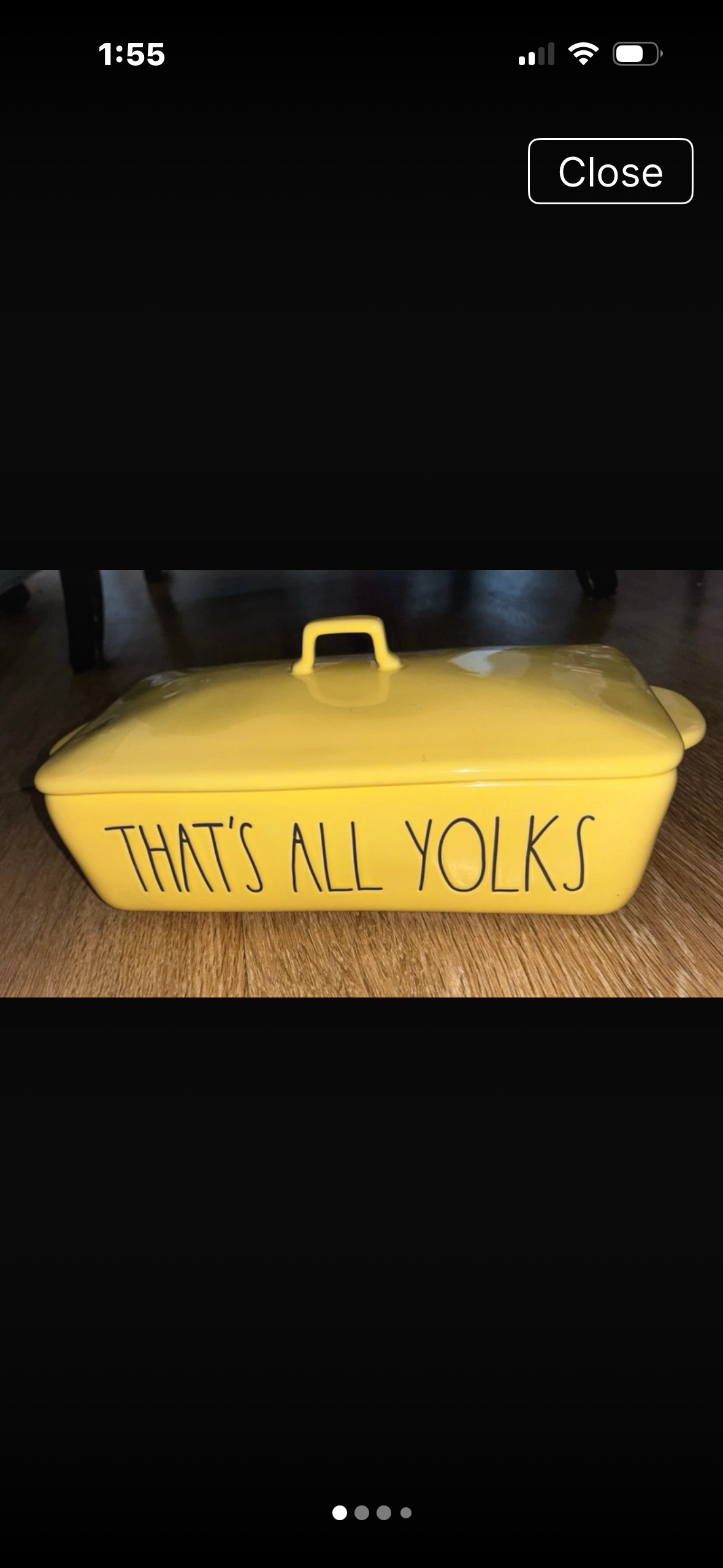 Yellow ceramic covered dish reading That's All Yolks